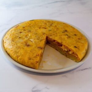 Tortilla Ulía de patata, jamón y queso de Tortillas La Isla, elaborada en Bar Ostadar